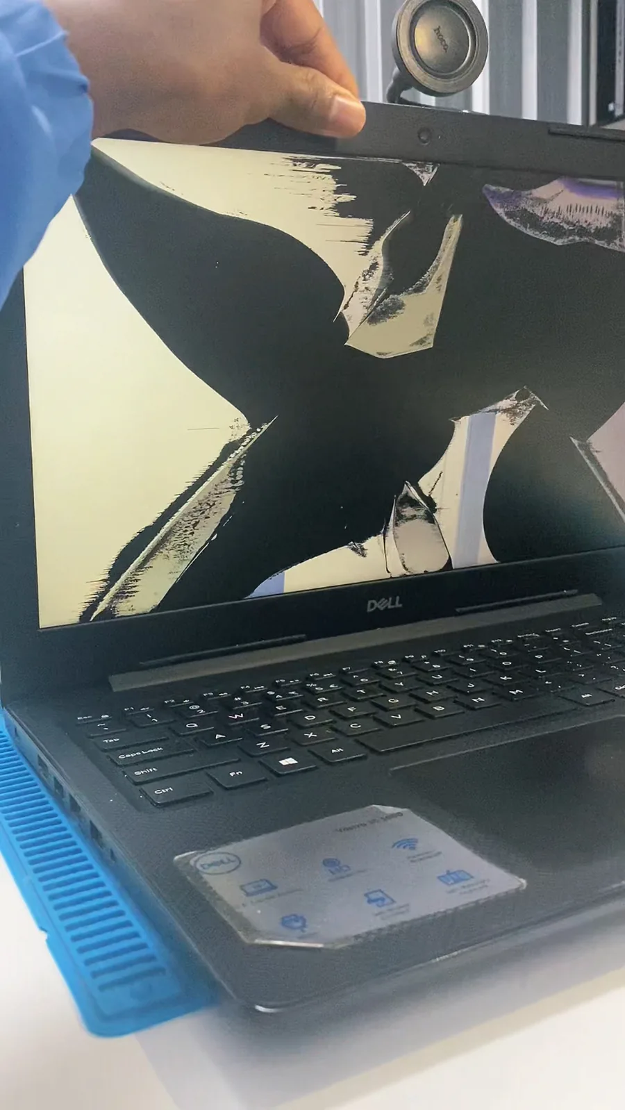 Cracked Dell laptop screen brought in for repair